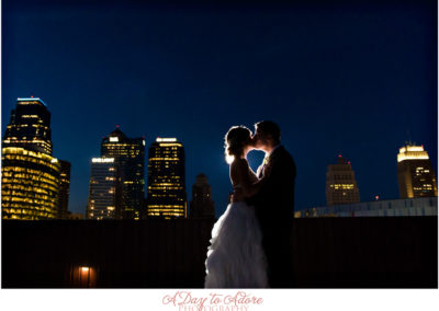 couple on roof kissing